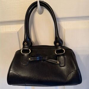 Small “Liz Claiborne" black handbag with bow.
